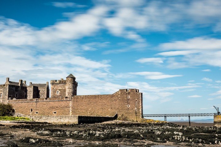 a castle on top of a stone building
